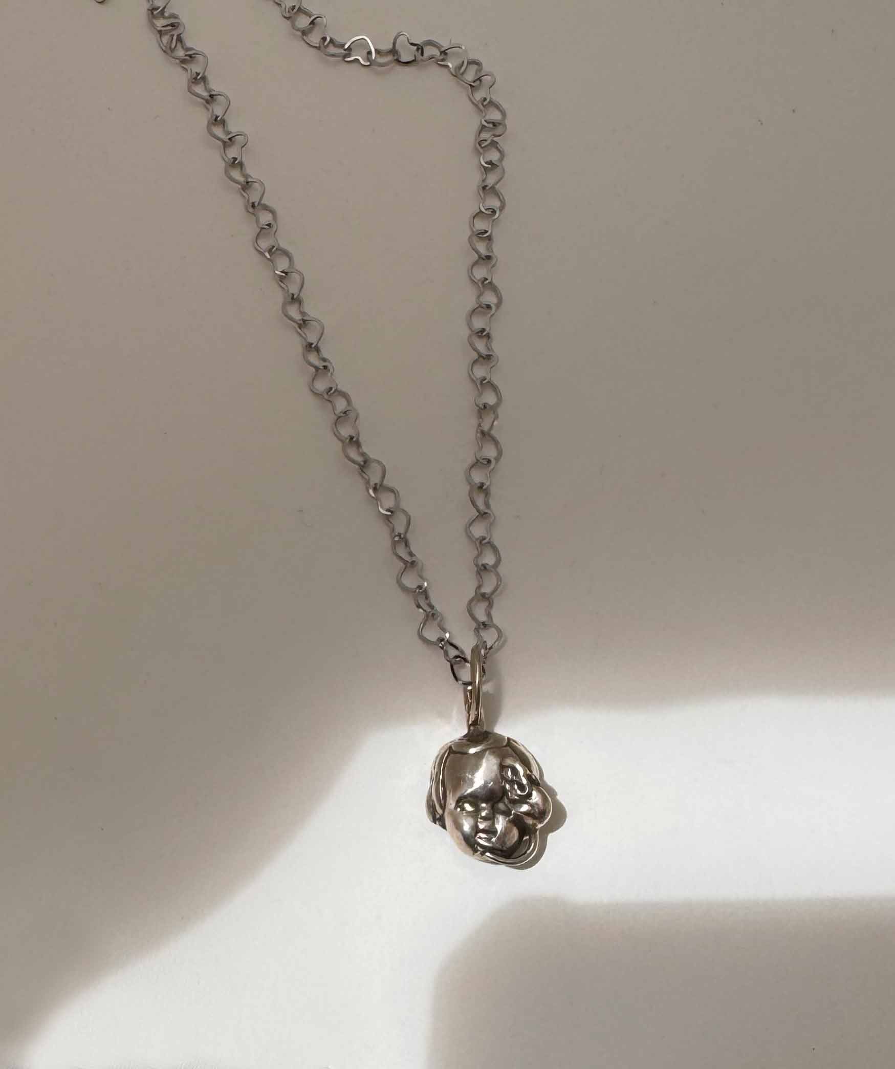 Baby Eating a Rat Necklace - Image 3