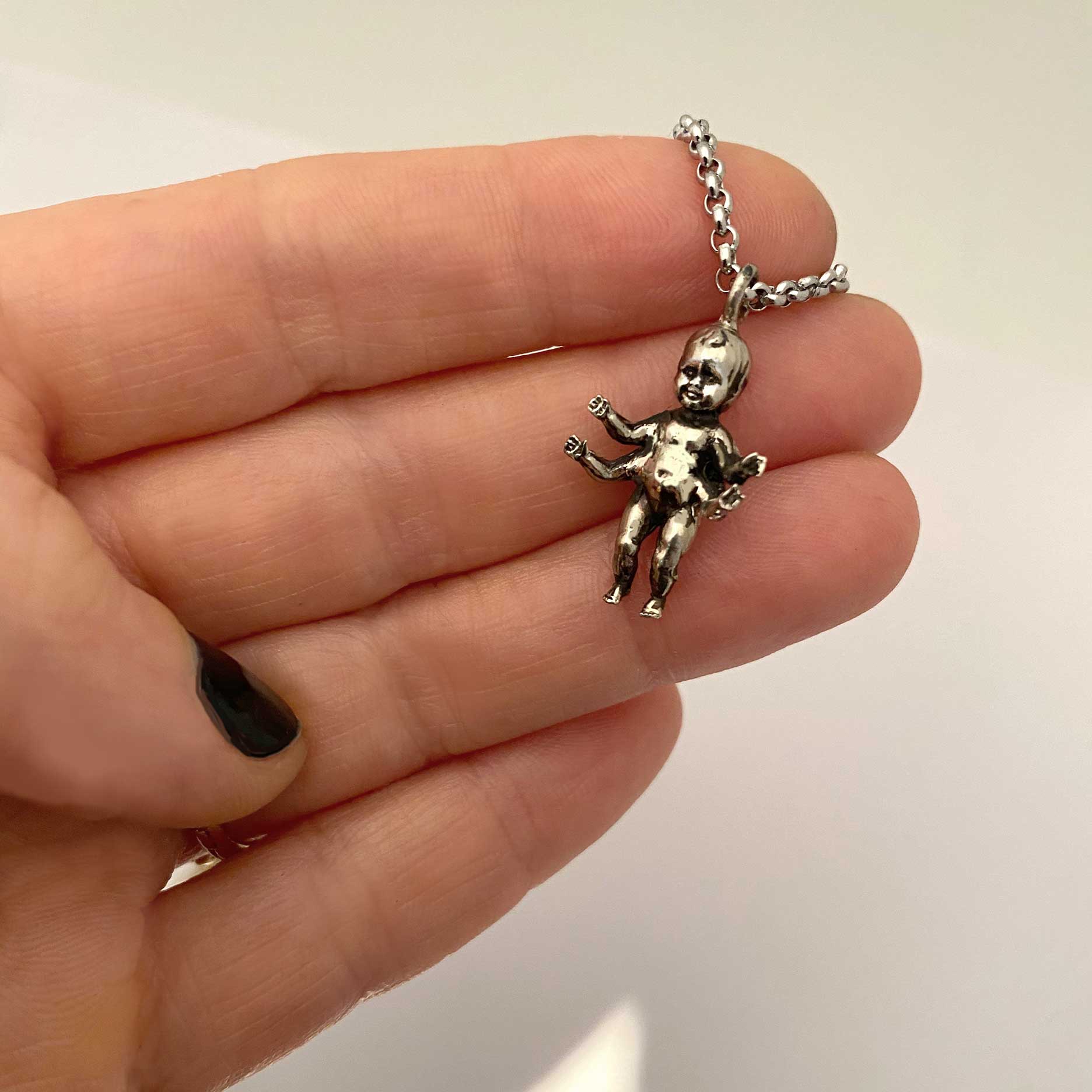 Four Armed Baby Necklace - Image 4