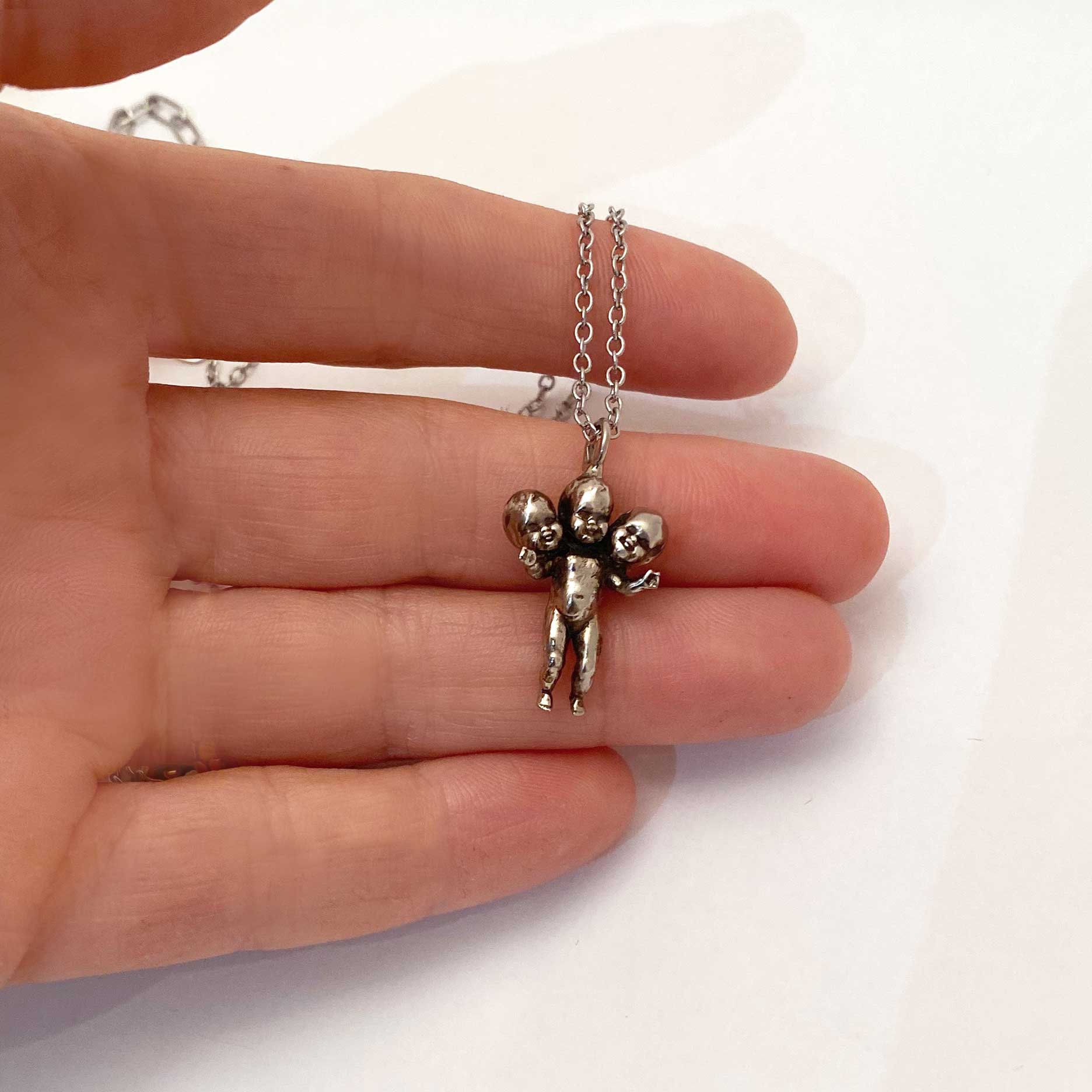 Three Headed Baby Necklace - Image 6