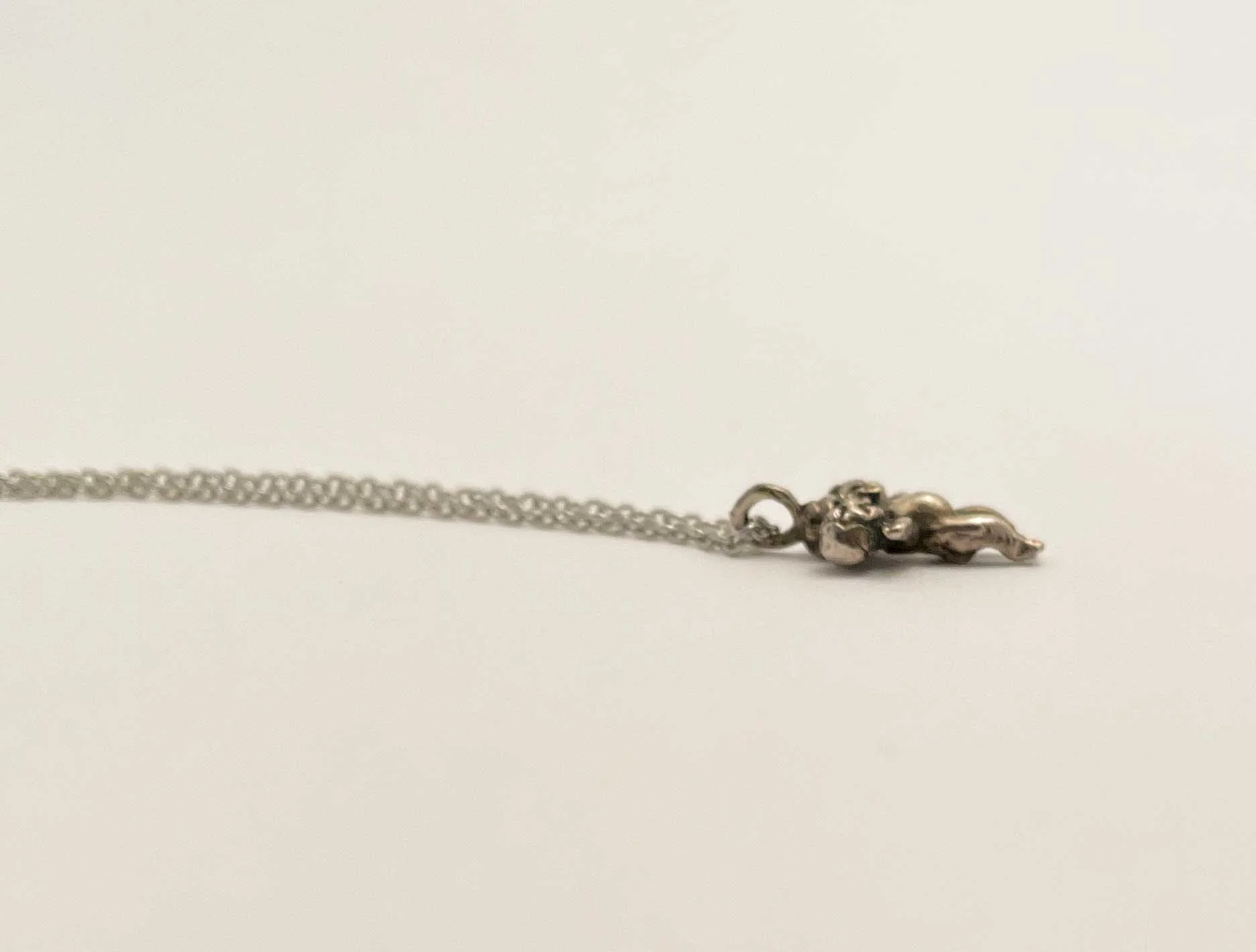 Tiny Three Headed Baby Necklace - Image 5